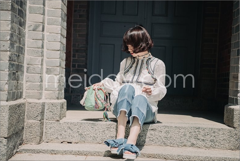 拼色毛边8分牛仔裤